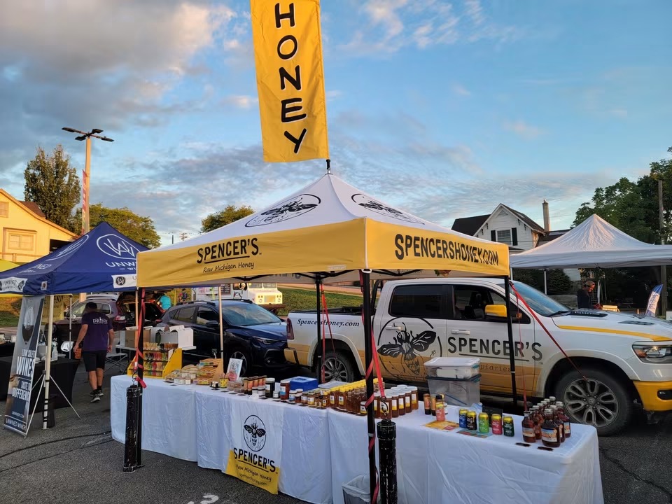 Spencer's Apiaries market stand and branded truck